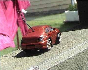 The ass shot! i converd the rear window because it was cut out for a duel cell but i didnt use it for the duel cell car any more so i coverd it up. even no it is a bit dodgy it looks better than it did
